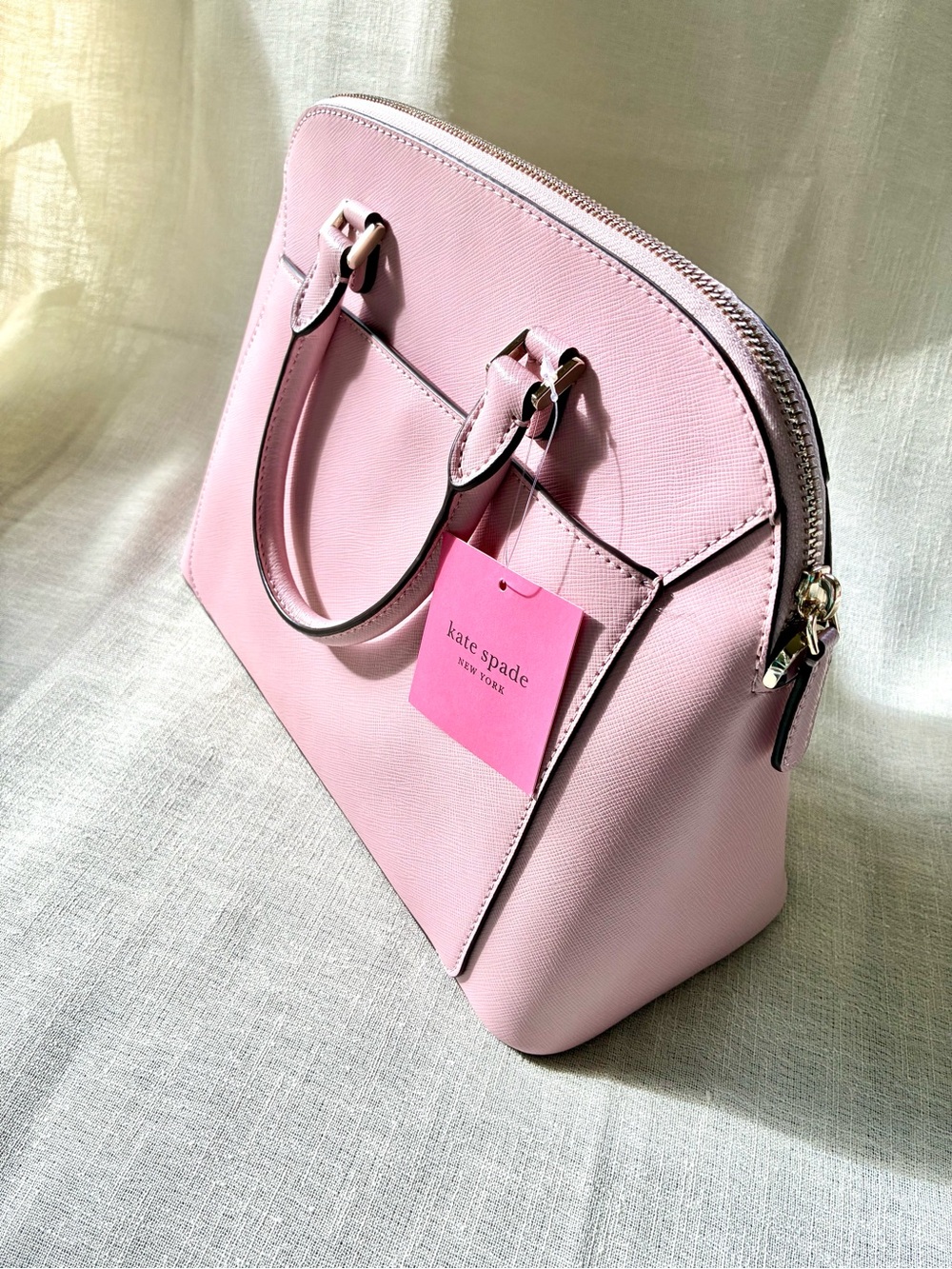 Kate Spade New York tutu pink leather dome satchel handbag. New with tags.